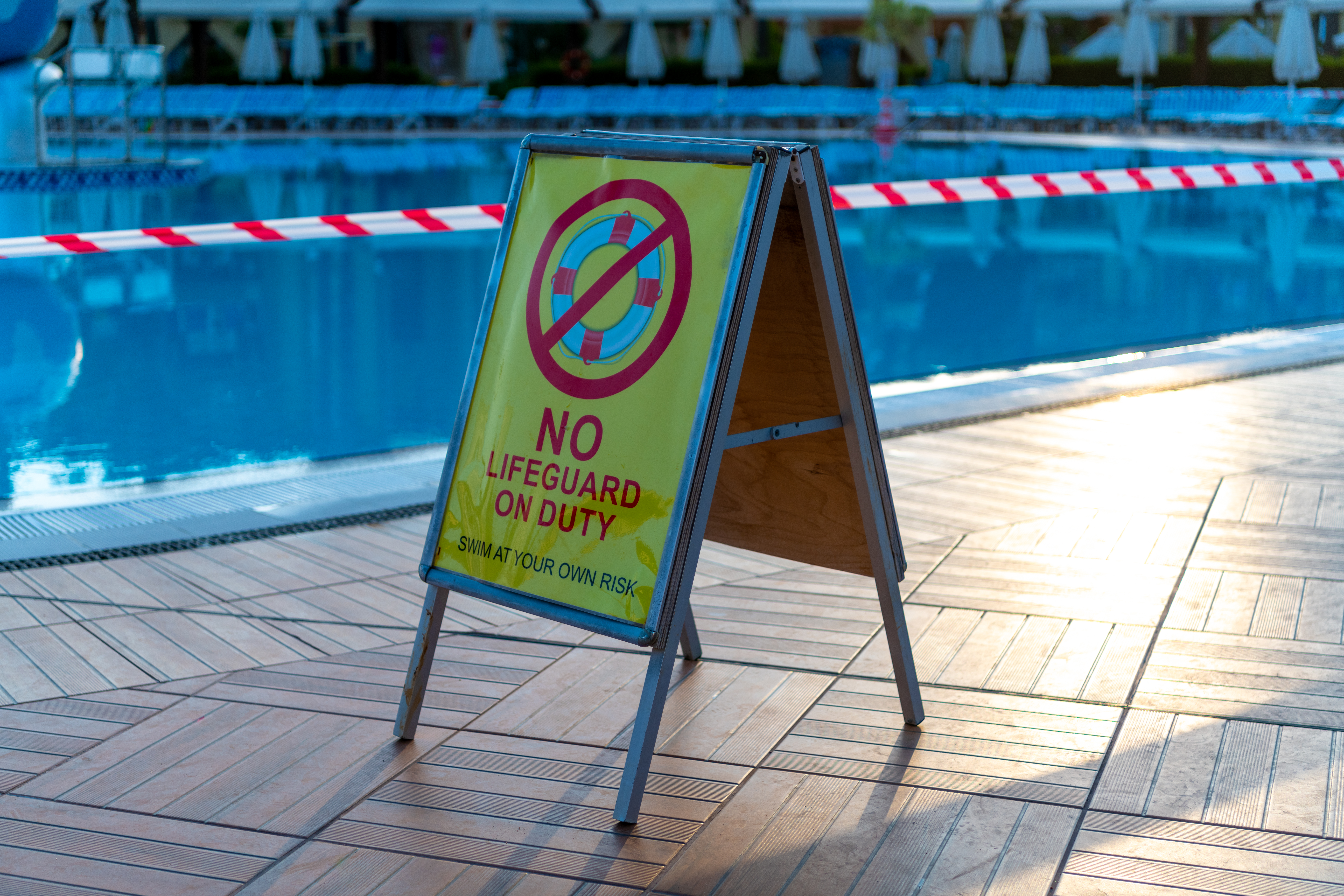 No Lifeguard on duty sign at a public pool
